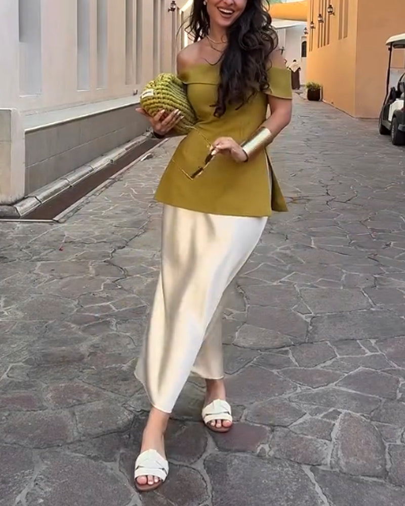 Elegante conjunto de dos piezas de falda y top con hombros descubiertos