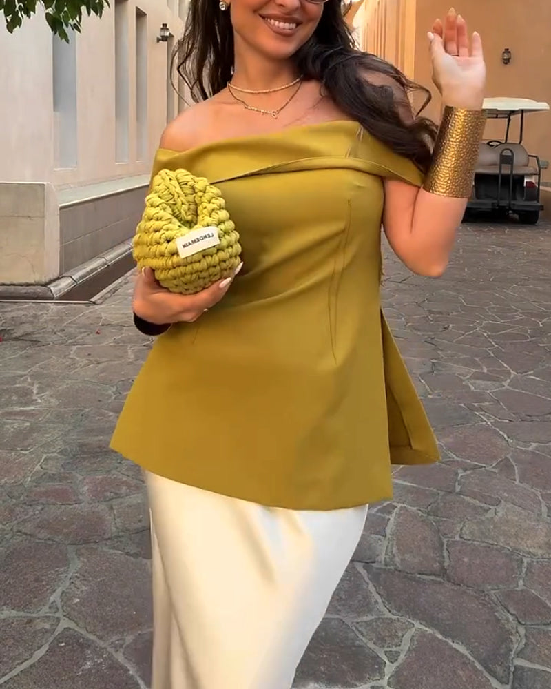 Elegante conjunto de dos piezas de falda y top con hombros descubiertos